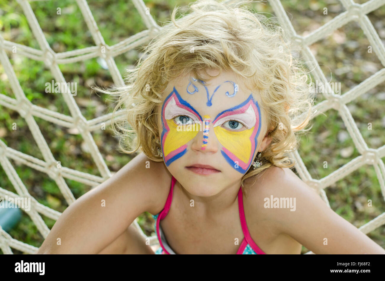 beautiful blond girl with face painting Stock Photo