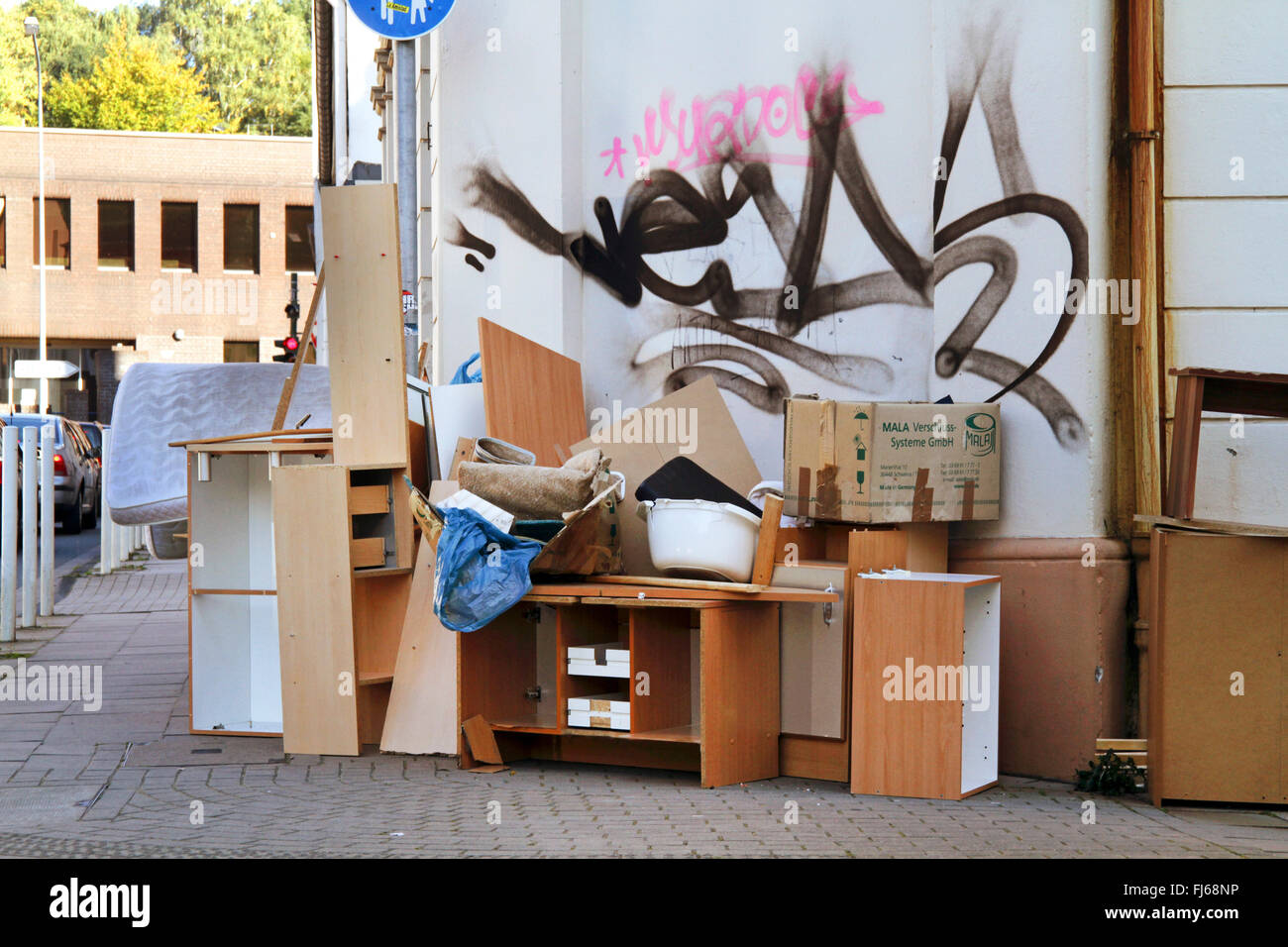 bulk rubbish on sidewalk, Germany Stock Photo