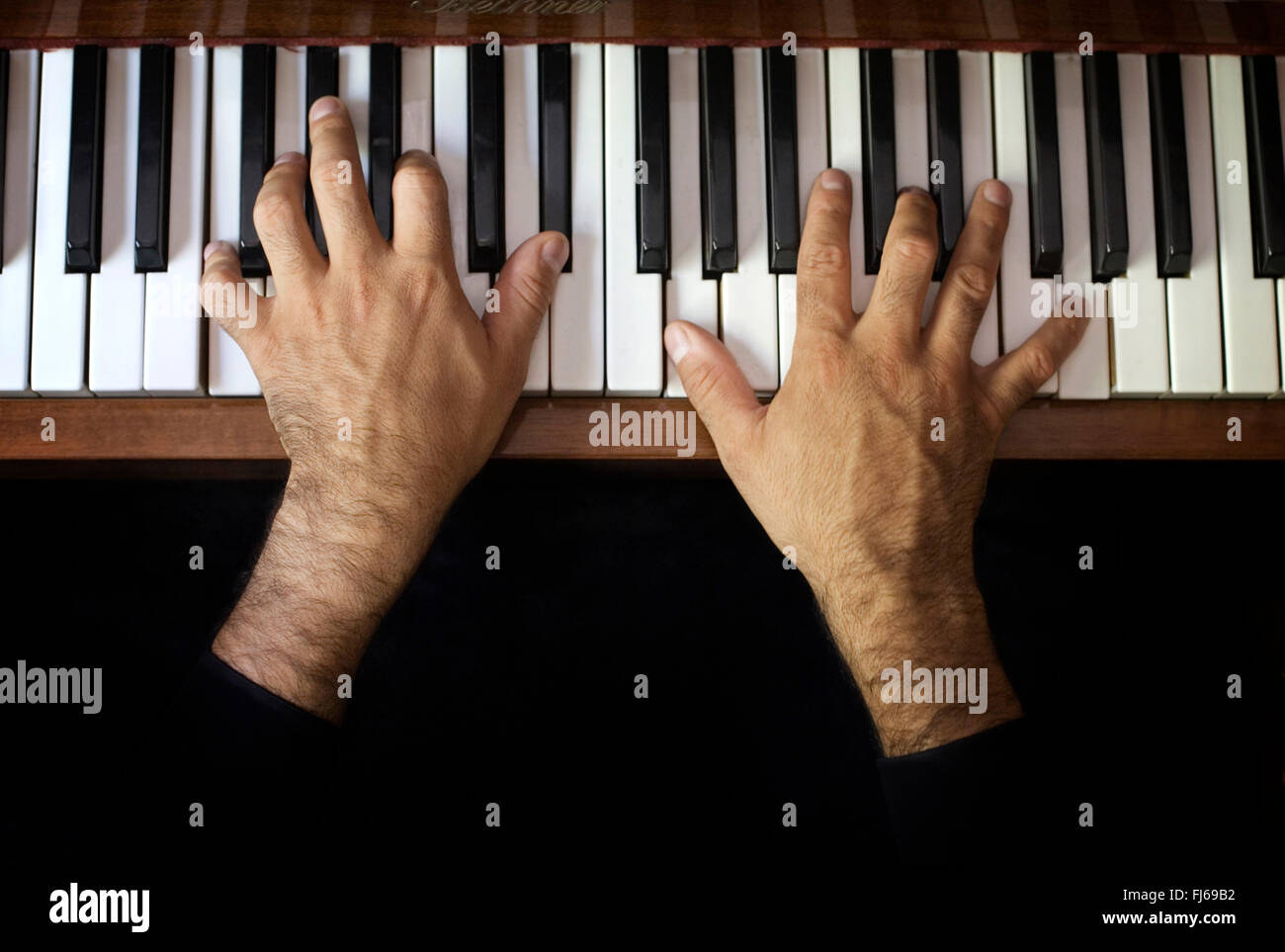 Piano hands above hi-res stock photography and images - Alamy