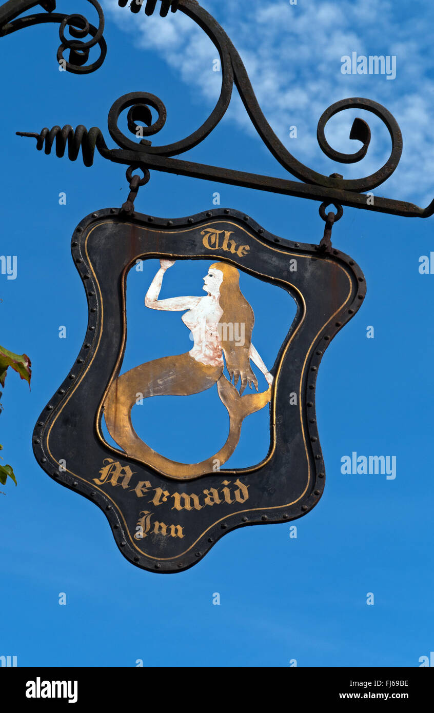 The Mermaid Sign, above The Mermaid Inn, on the famous cobbled Mermaid Street in Rye, East Sussex, England Stock Photo