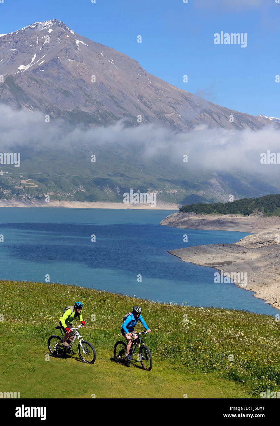 Mountain biking around Alp lake Lac du Mont Cenis, France, Savoie Stock