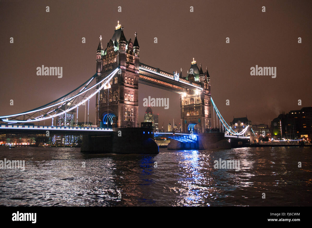 London, UK, 12/2012. View of London Bridge and river Thames at night Stock Photo