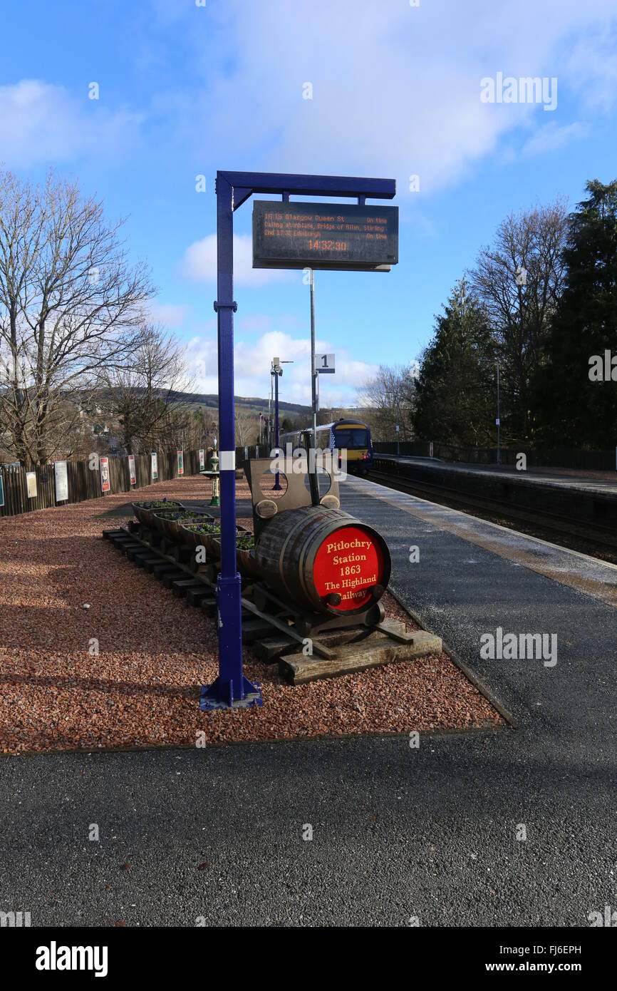 Southbound Scotrail train and ornamental train Pitlochry Railway