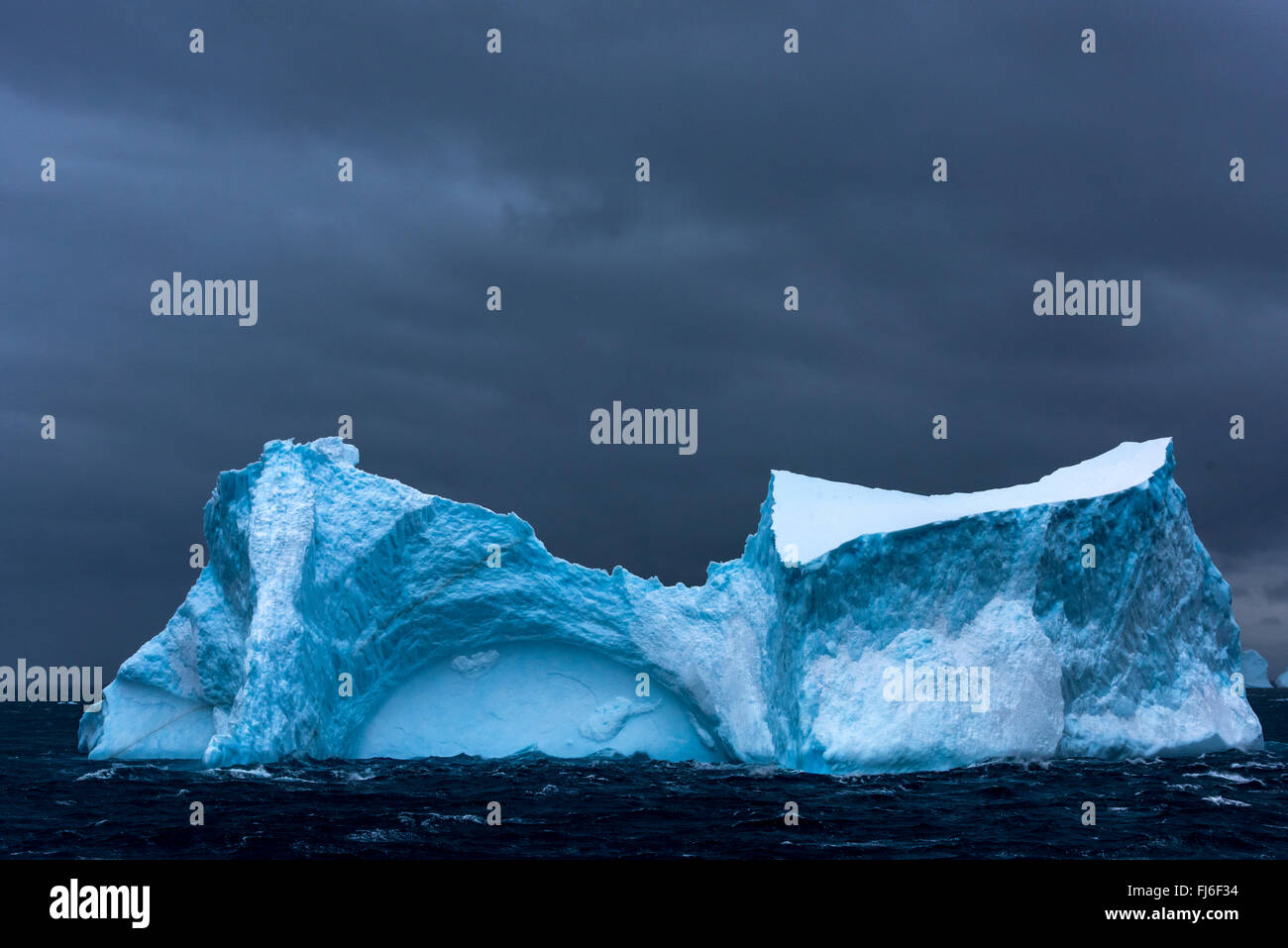 Giant Iceberg floating at sea near Cooper Bay, South Georgia Stock Photo