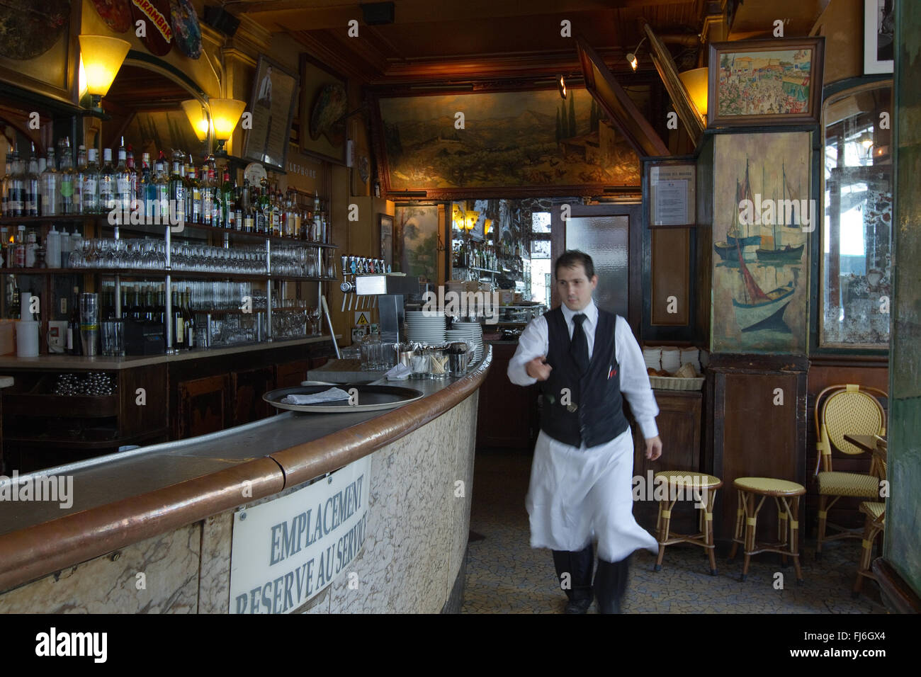 Parisian waiter at the Cafe La Palette Paris France Stock Photo