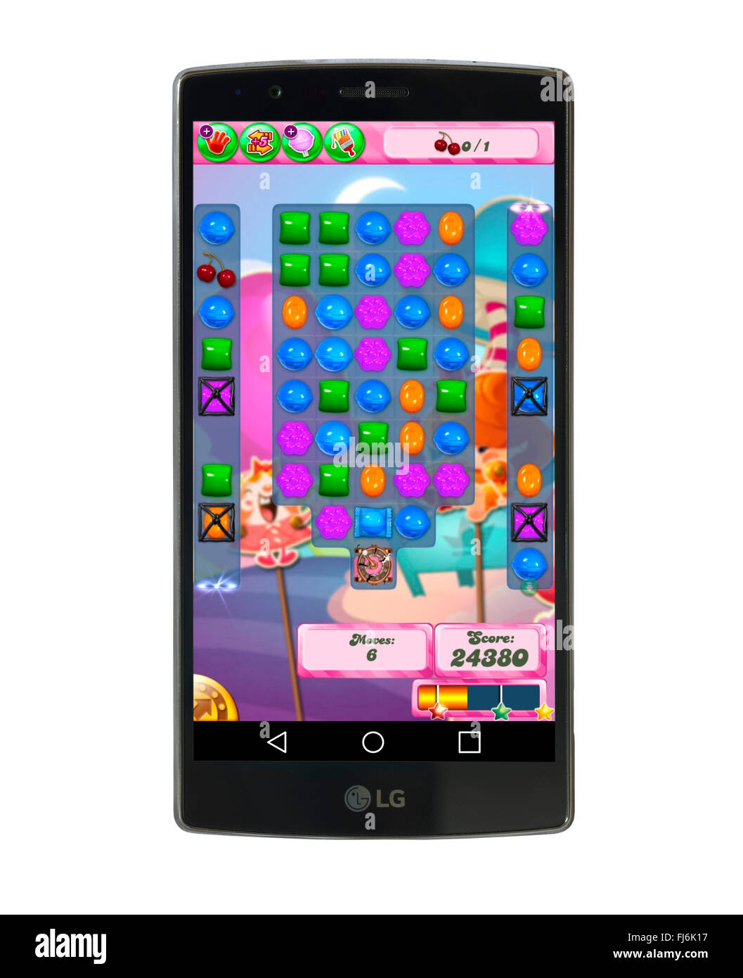 Playing Candy Crush Saga on an an LG G4 5.5 inch Android smartphone Stock Photo