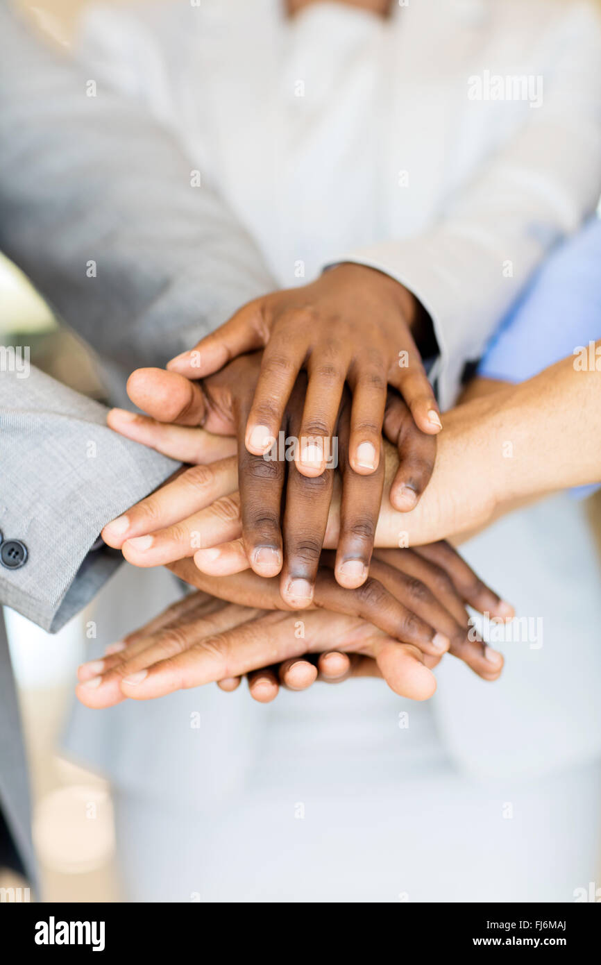 close up of business people hands together Stock Photo