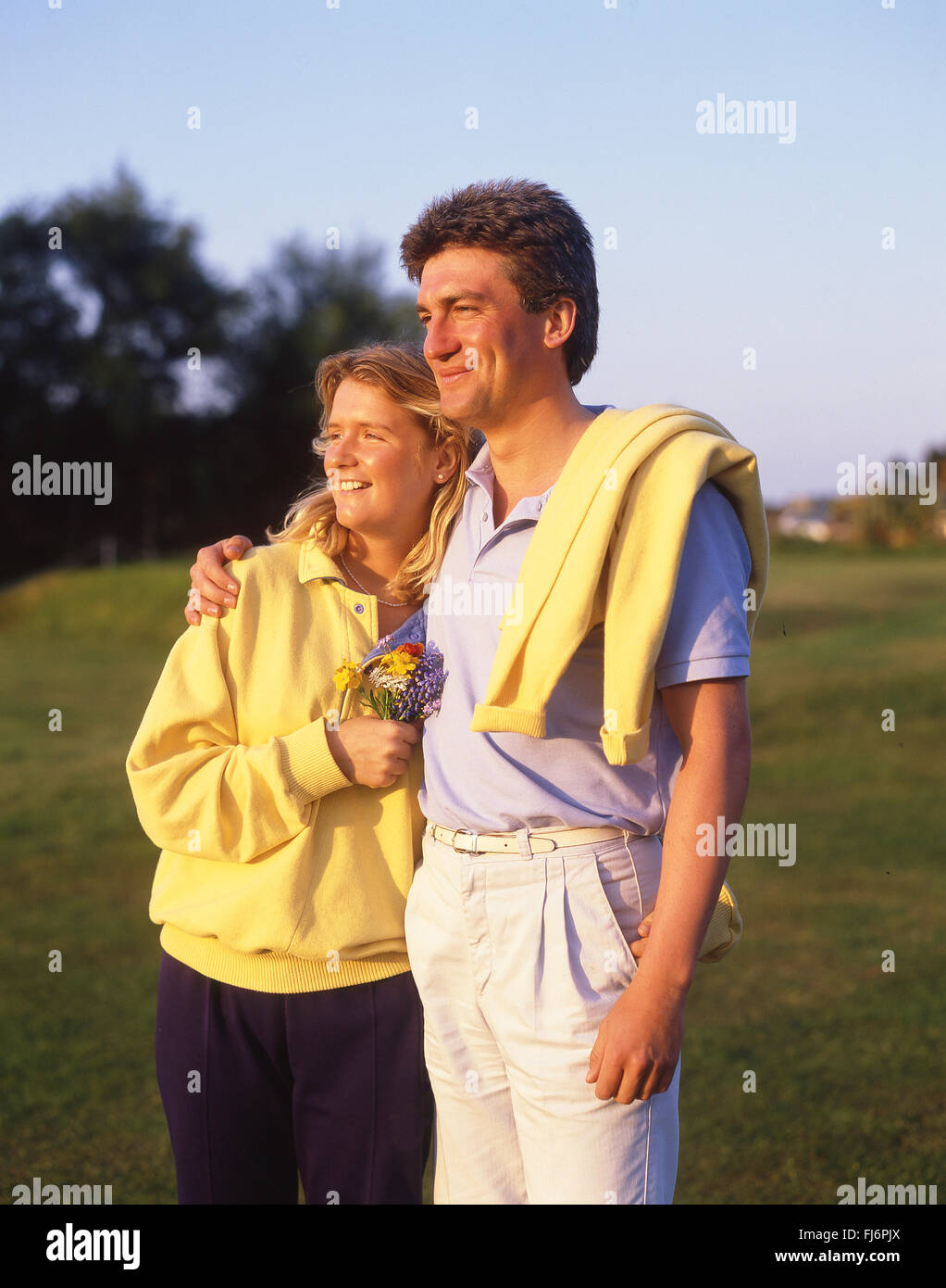 Young couple on countryside walk, Shropshire, England, United Kingdom Stock Photo