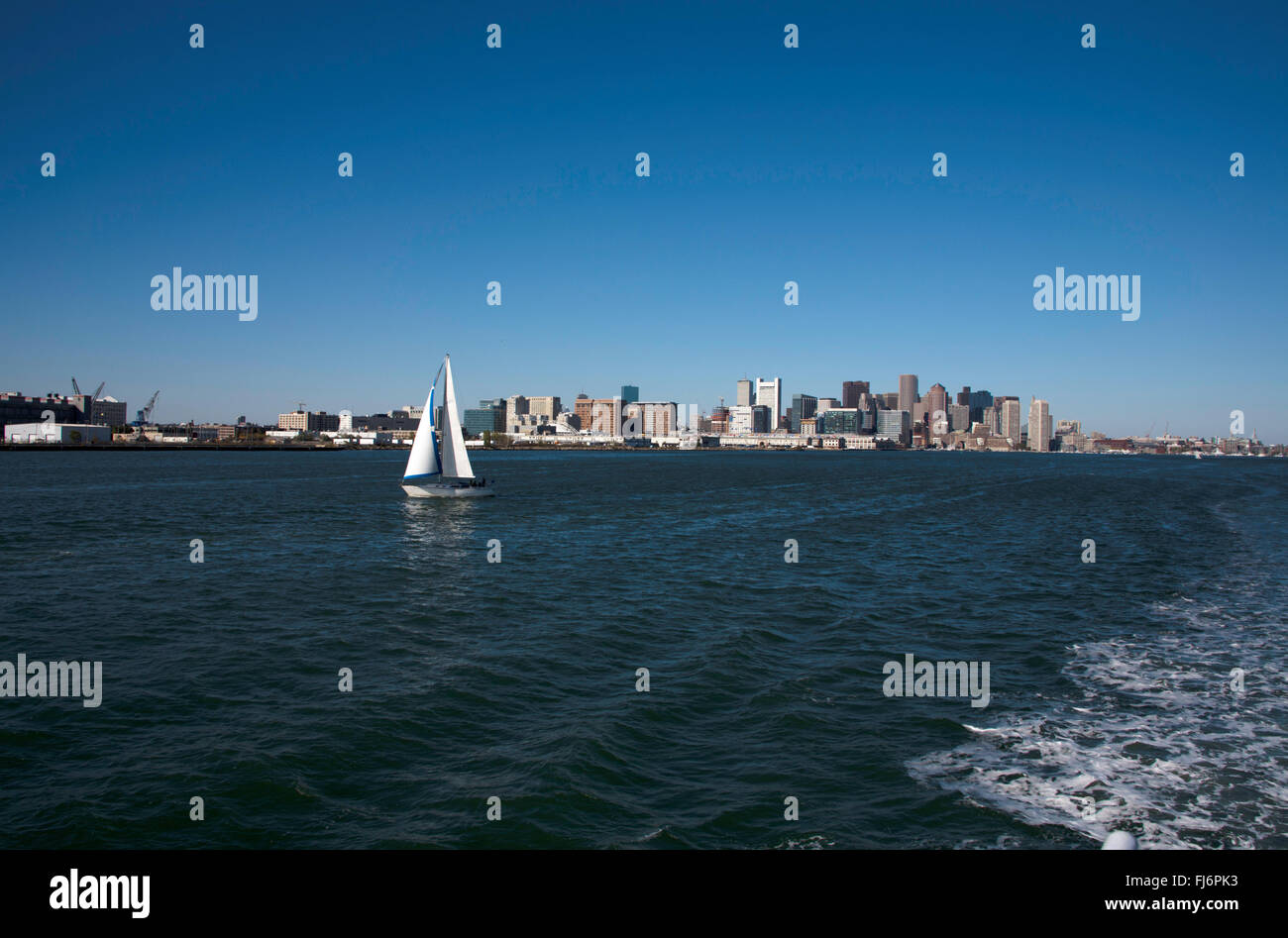 Yacht sailing around Boston harbor an area of Massachusetts Bay Boston