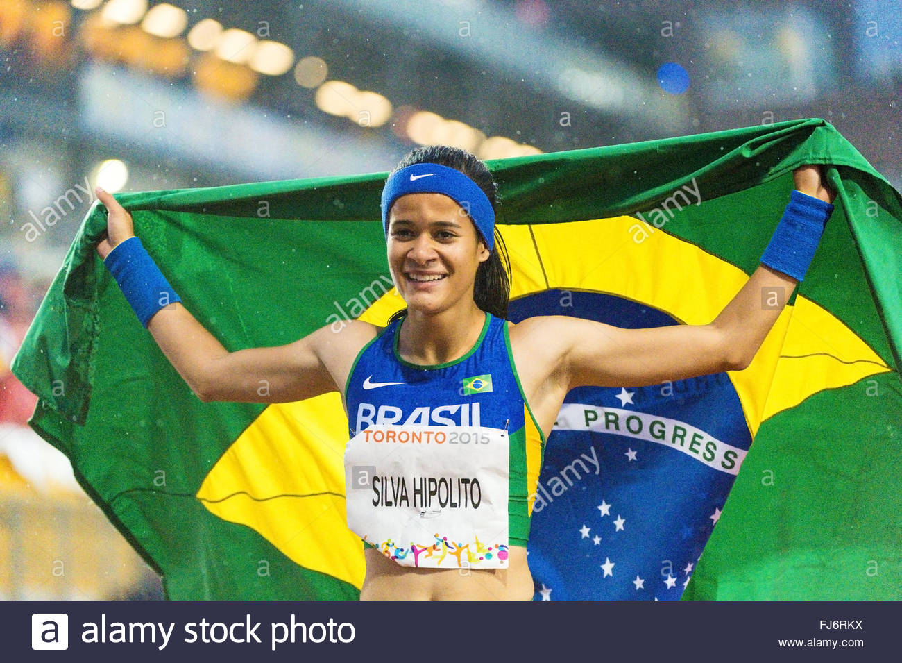 Veronica Silva Hipolito Brazilian Paralympic Athlete Holding The Brazil Flag During The Parapan Am Games 2015 Veronica Silva Hipolito Brazilian Paralympic Athlete Holding The Brazil Flag During The Parapan Am Games 2015