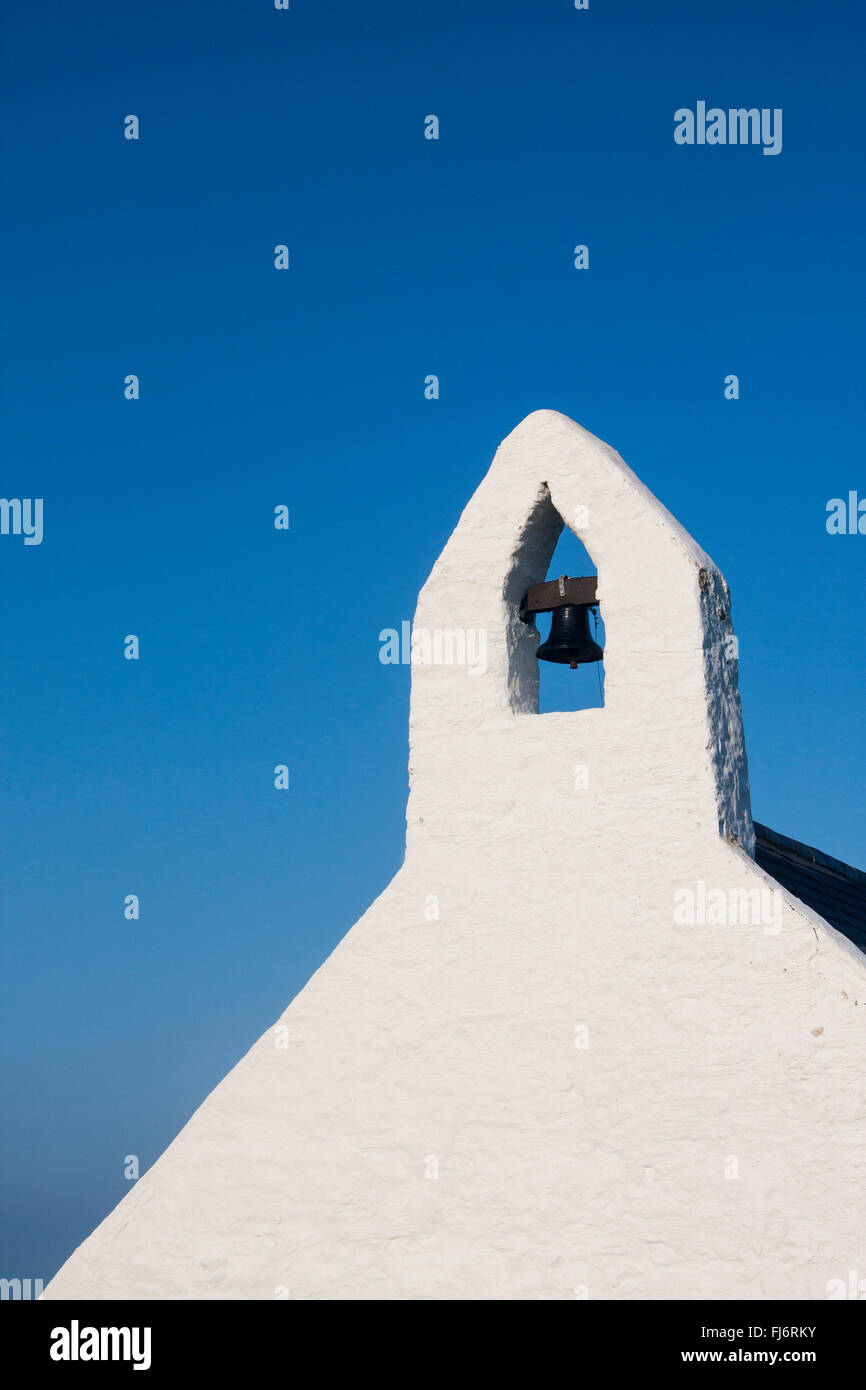 Mwnt Church of the Holy Cross Eglwys y Grog Close-up of bellcote at sunset Mwnt Ceredigion West Wales UK Stock Photo