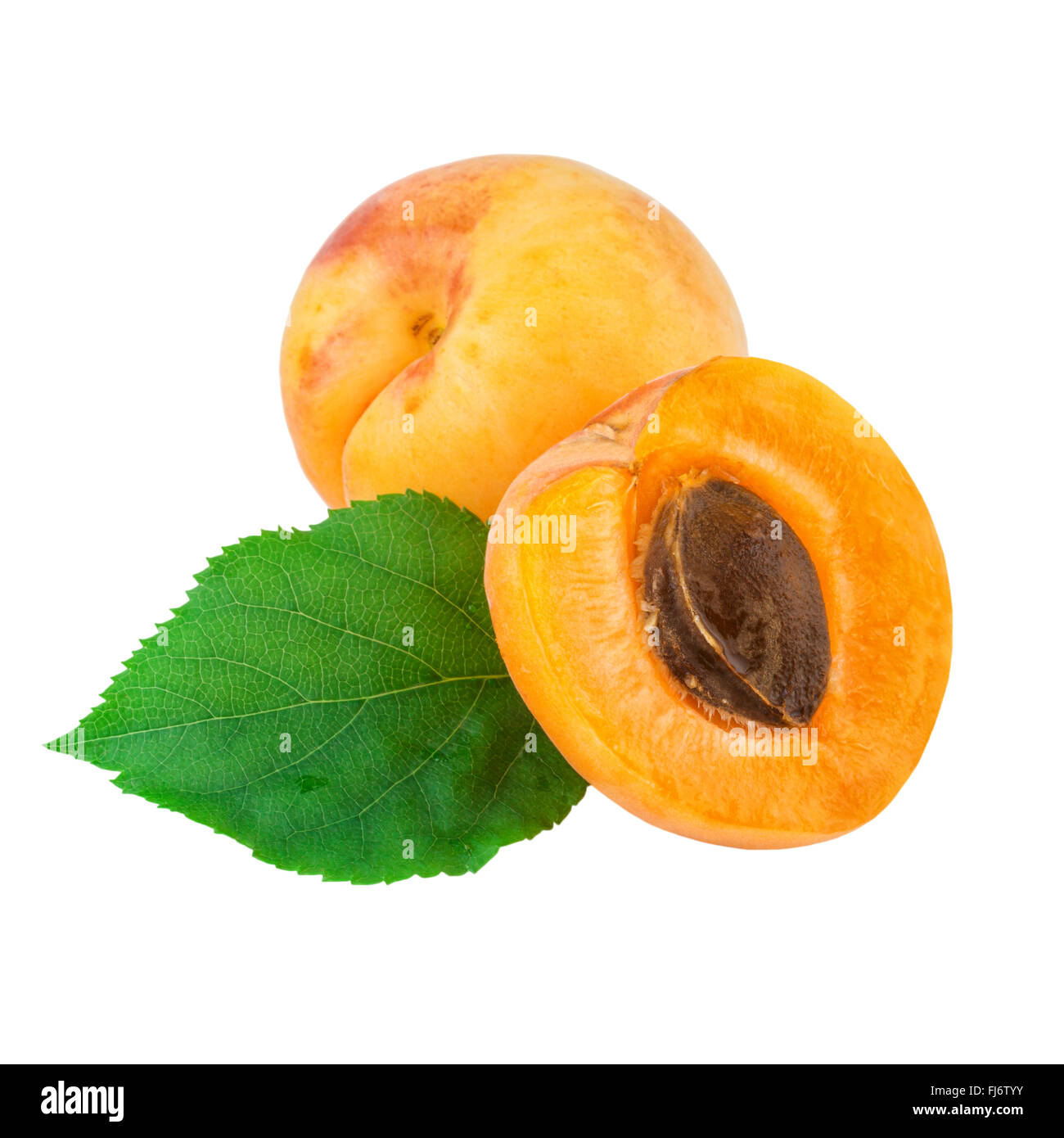 apricot fruit whole half with green leaf isolated on white Stock Photo