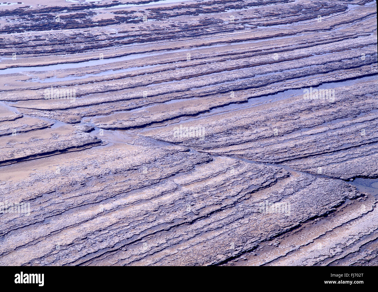 Traeth Mawr near Southerndown high elevated abstract view of wave cut platforms on rocky beach VAle of Glamorgan Heritage Coast Stock Photo