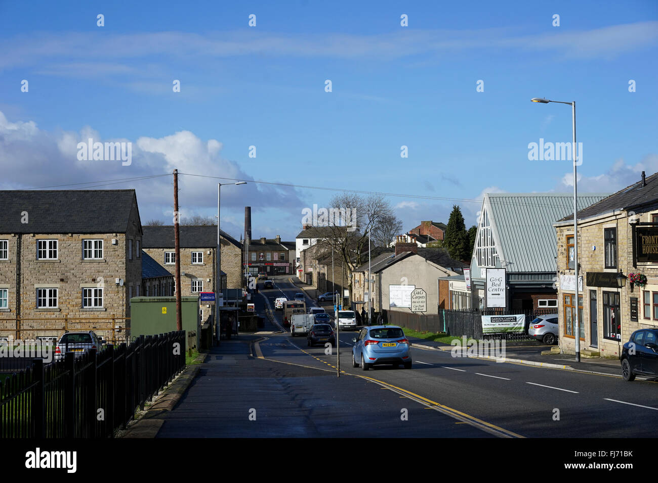 The A669 going through Lees village, Oldham, Greater Manchester, UK
