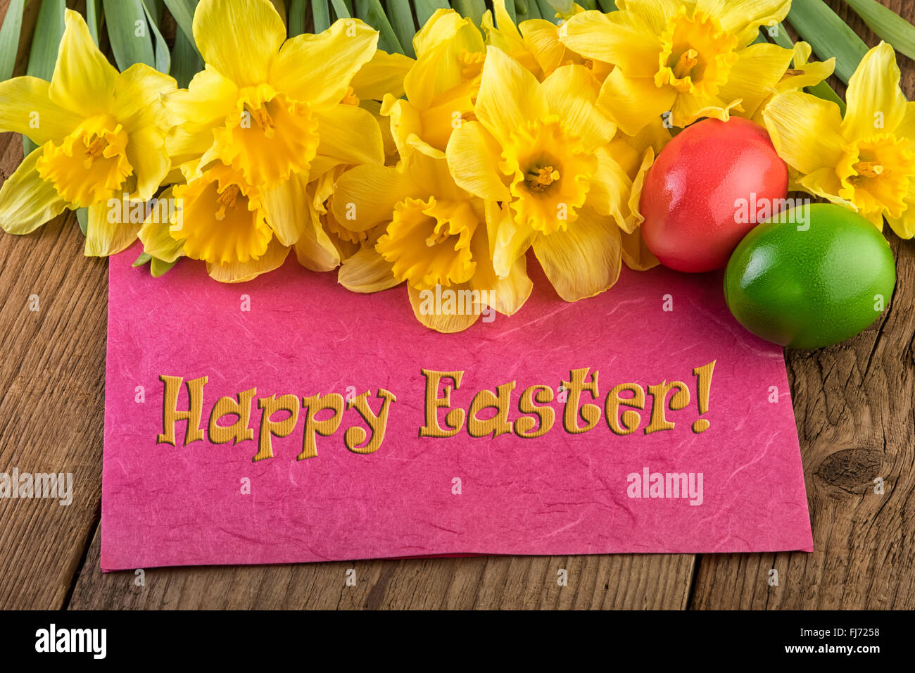 Easter yellow flowers greeting card Happy Easter Stock Photo