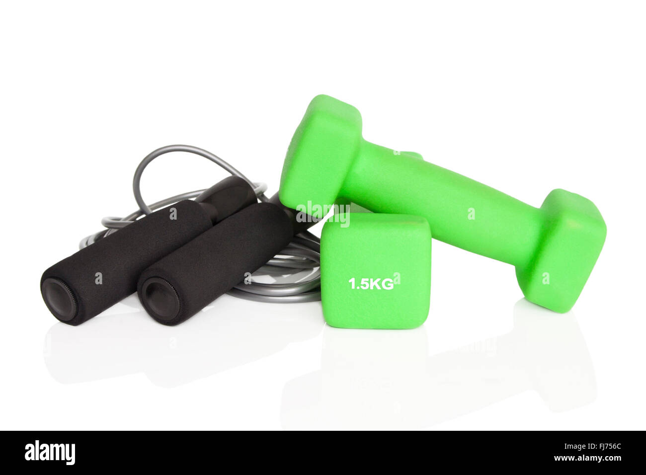 Dumbbells and skipping rope isolated on white background. Weights for a