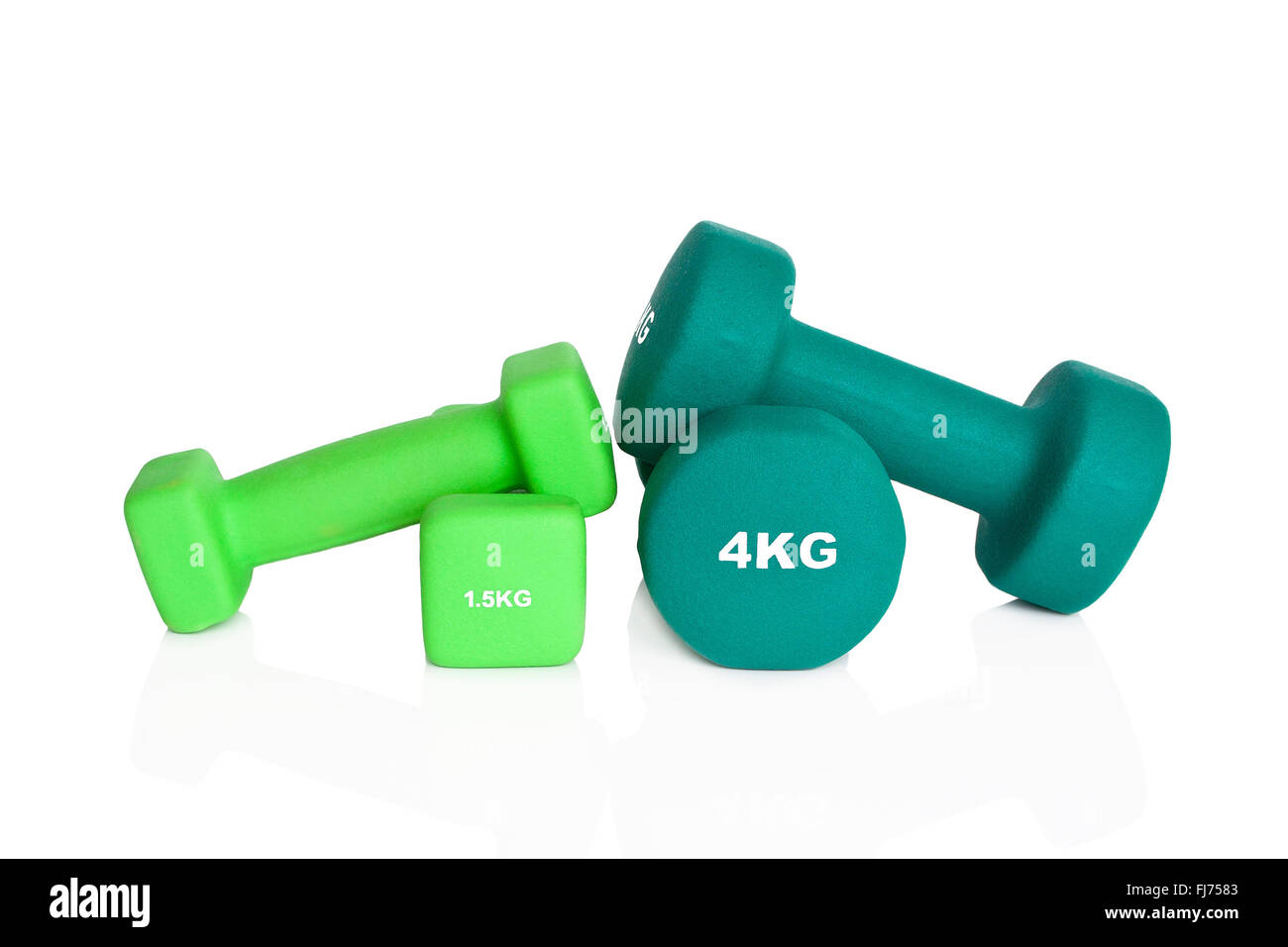 Green 4kg and 1.5kg dumbbells isolated on white background. Weights for a fitness training. Stock Photo