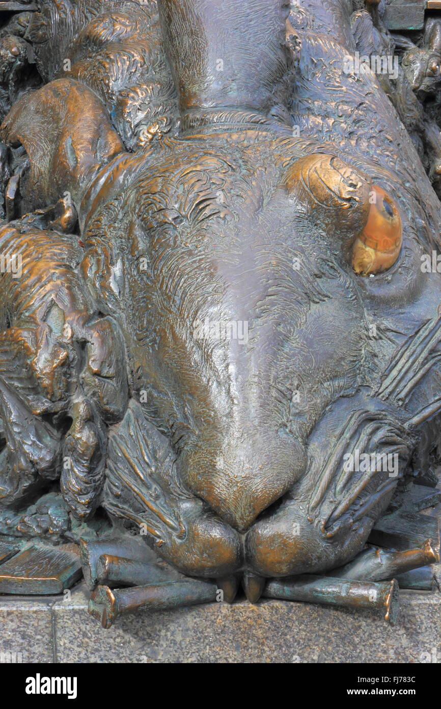 The modern bronze sculpture of a huge hare established about the house