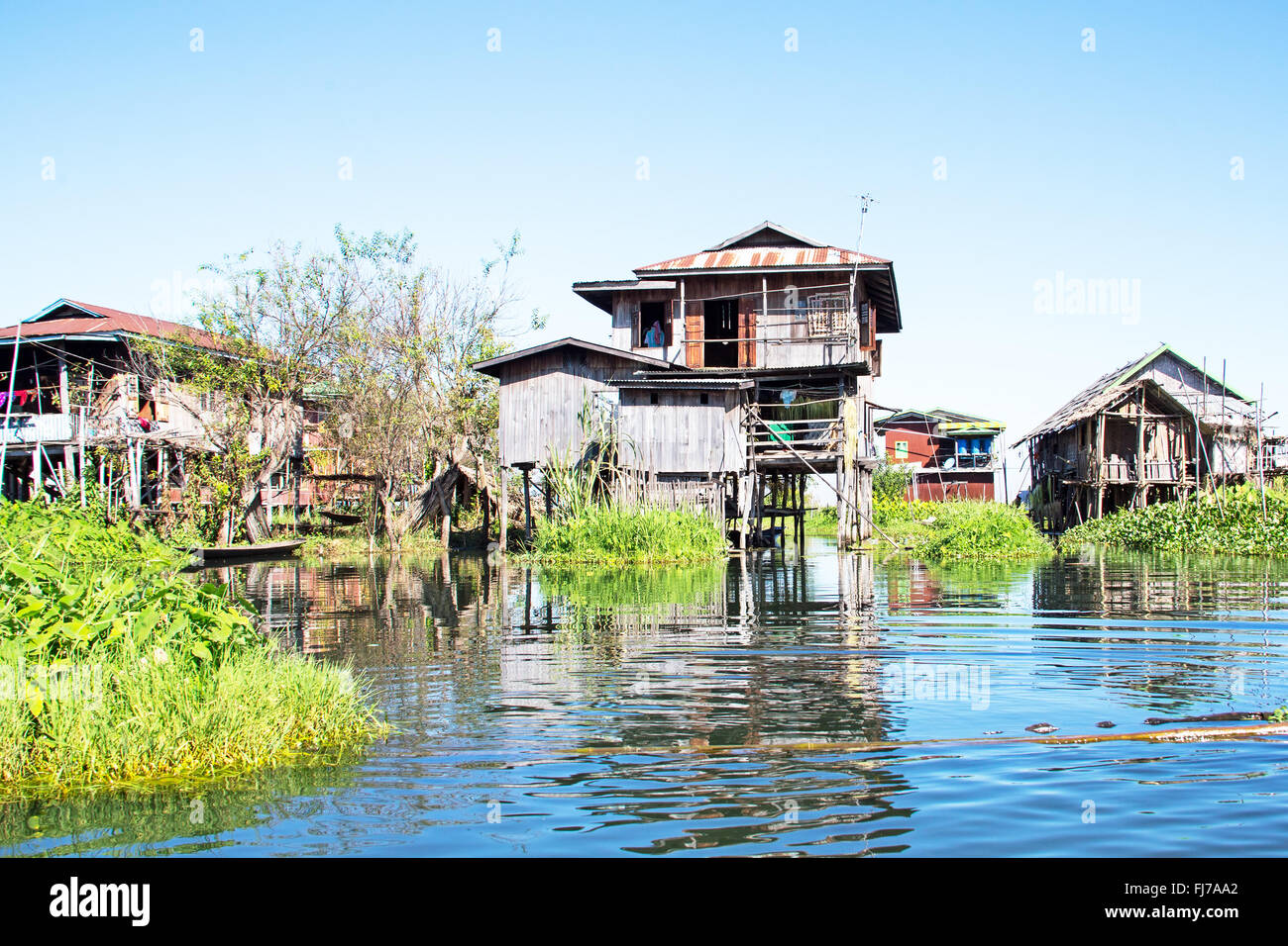 Traditional floating village houses in Inle Lake, Myanmar Stock Photo