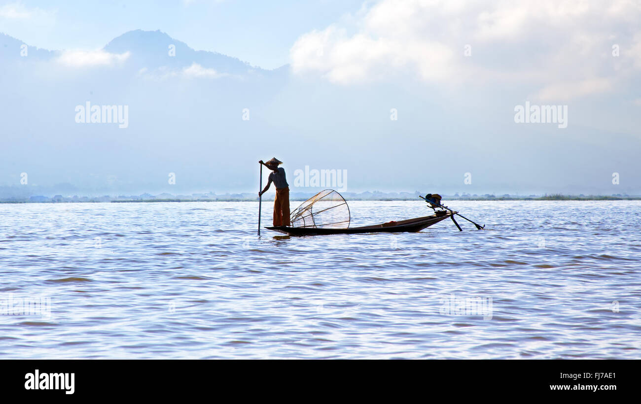 Silhouette of fisherman at sunset Inle Lake Burma Myanmar Stock Photo ...