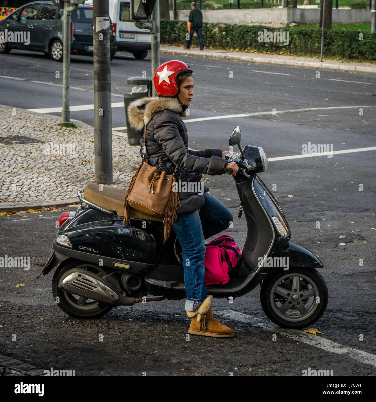 Girl on moped hi res stock photography and images Alamy
