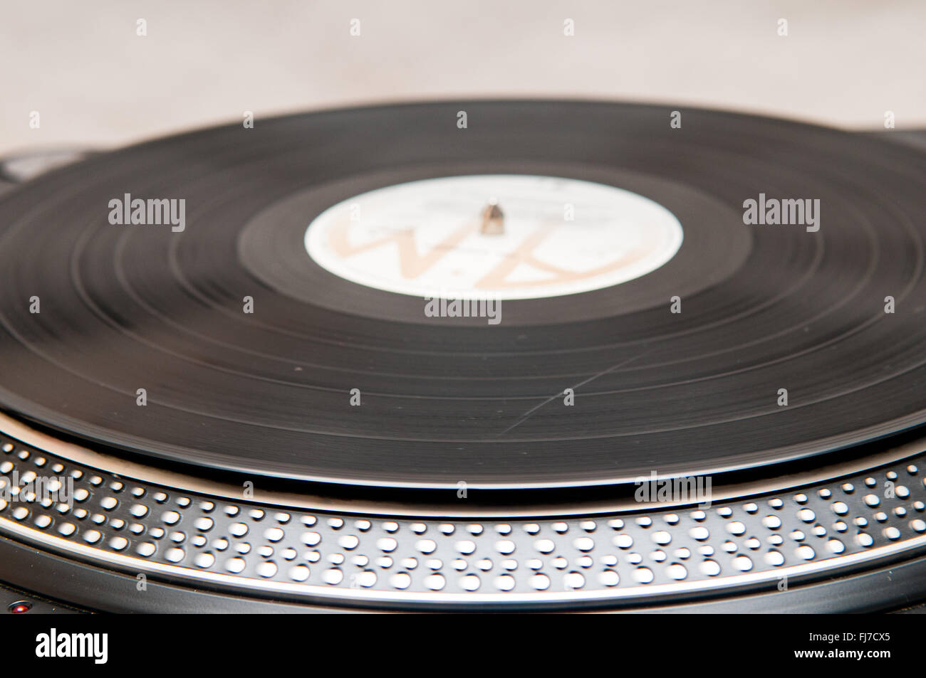 Old style vinyl record spinning on a turntable Stock Photo - Alamy