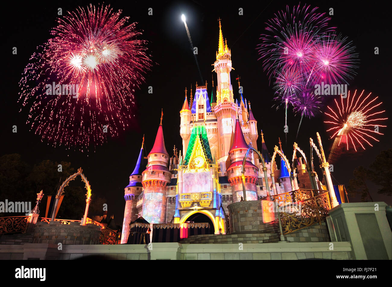 Display of fireworks and colorful lights on Cinderella's Castle in Magic Kingdom at DisneyWorld, Orlando, Florida USA. Stock Photo