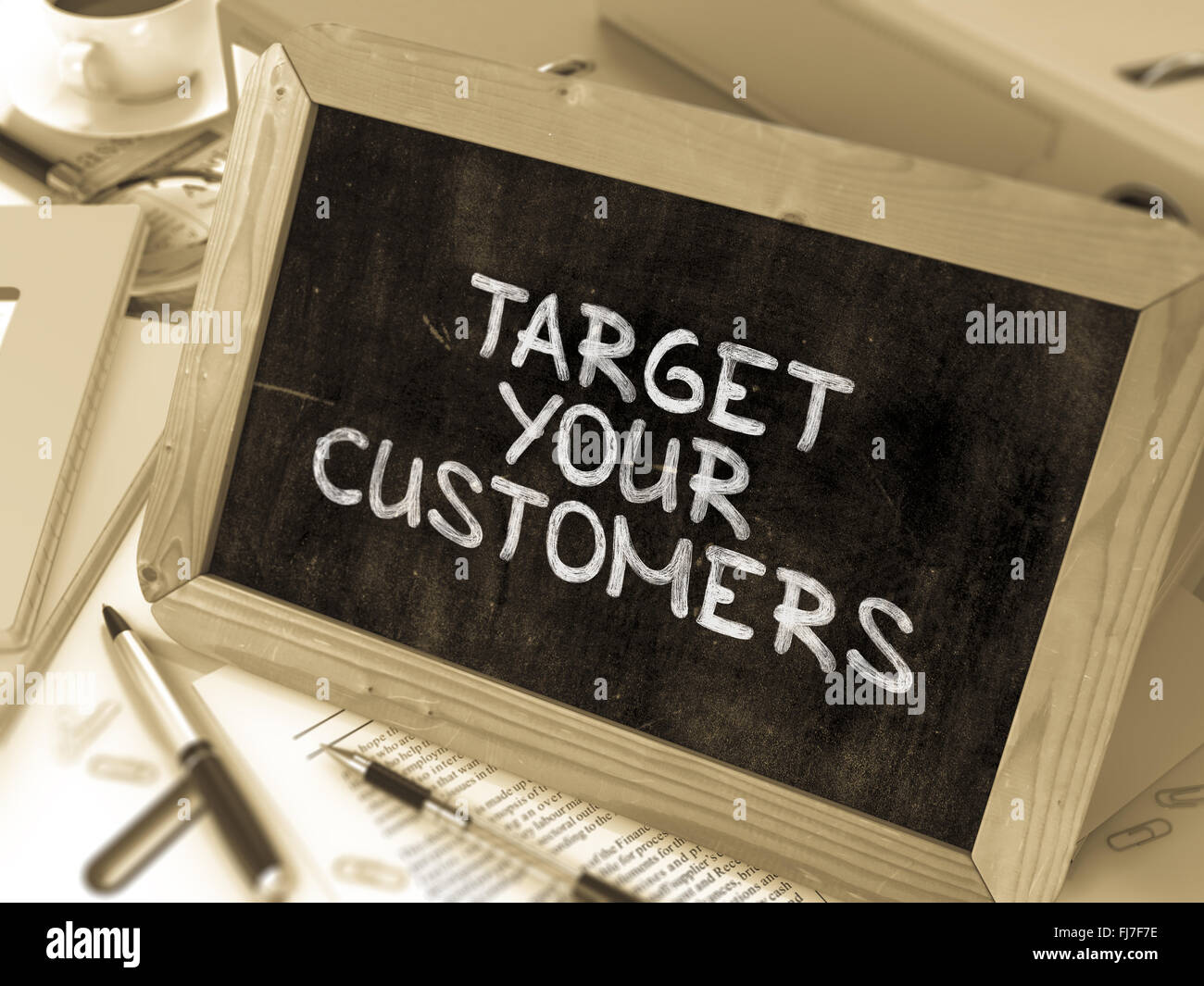 Target Handwritten Handwritten Target Your Customers on a Chalkboard Stock Photo - Alamy