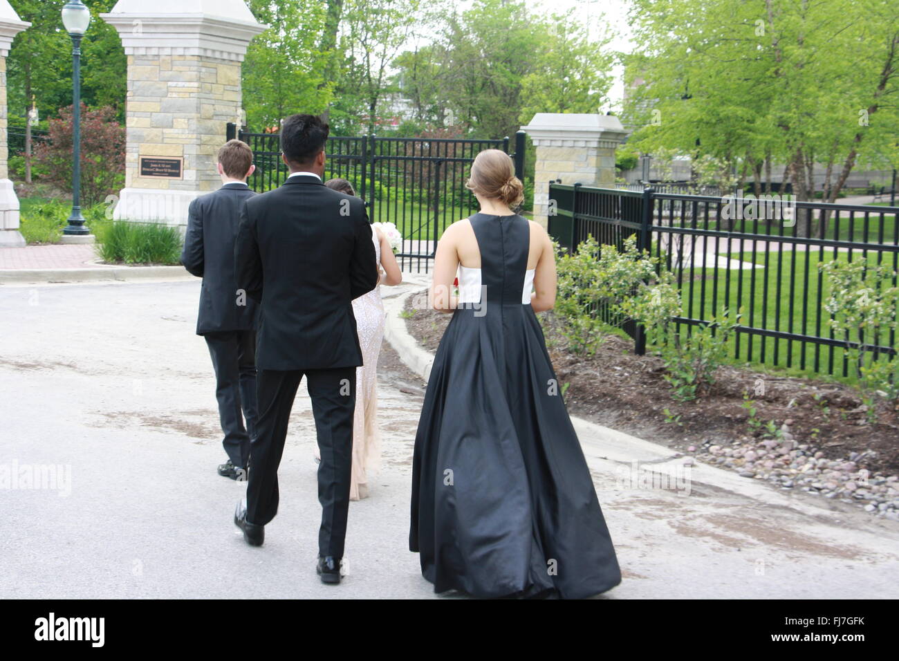 Boston teenagers pose for prom pictures after high school dance