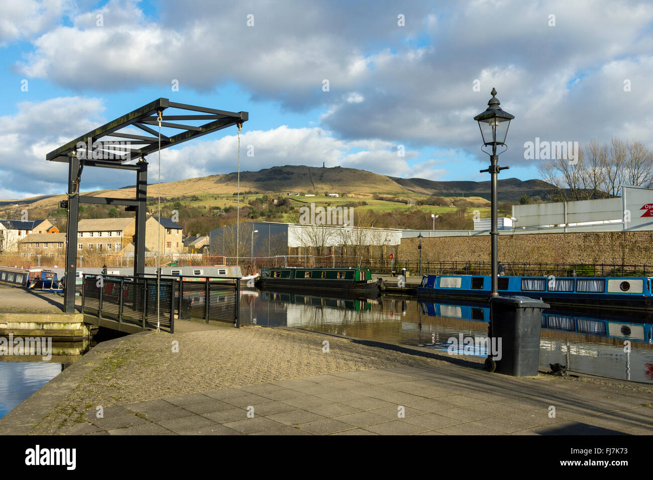 Alderman Hill from Frenches Marina on the Huddersfield Narrow canal at Greenfield, Saddleworth, Greater Manchester, UK. Stock Photo