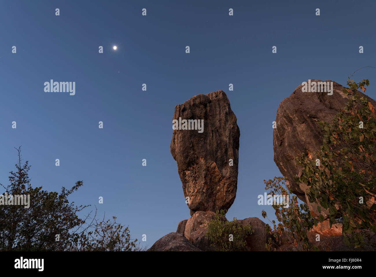 Balancing rock after sunset in the Chillagoe-Mungana Caves National Park. Stock Photo