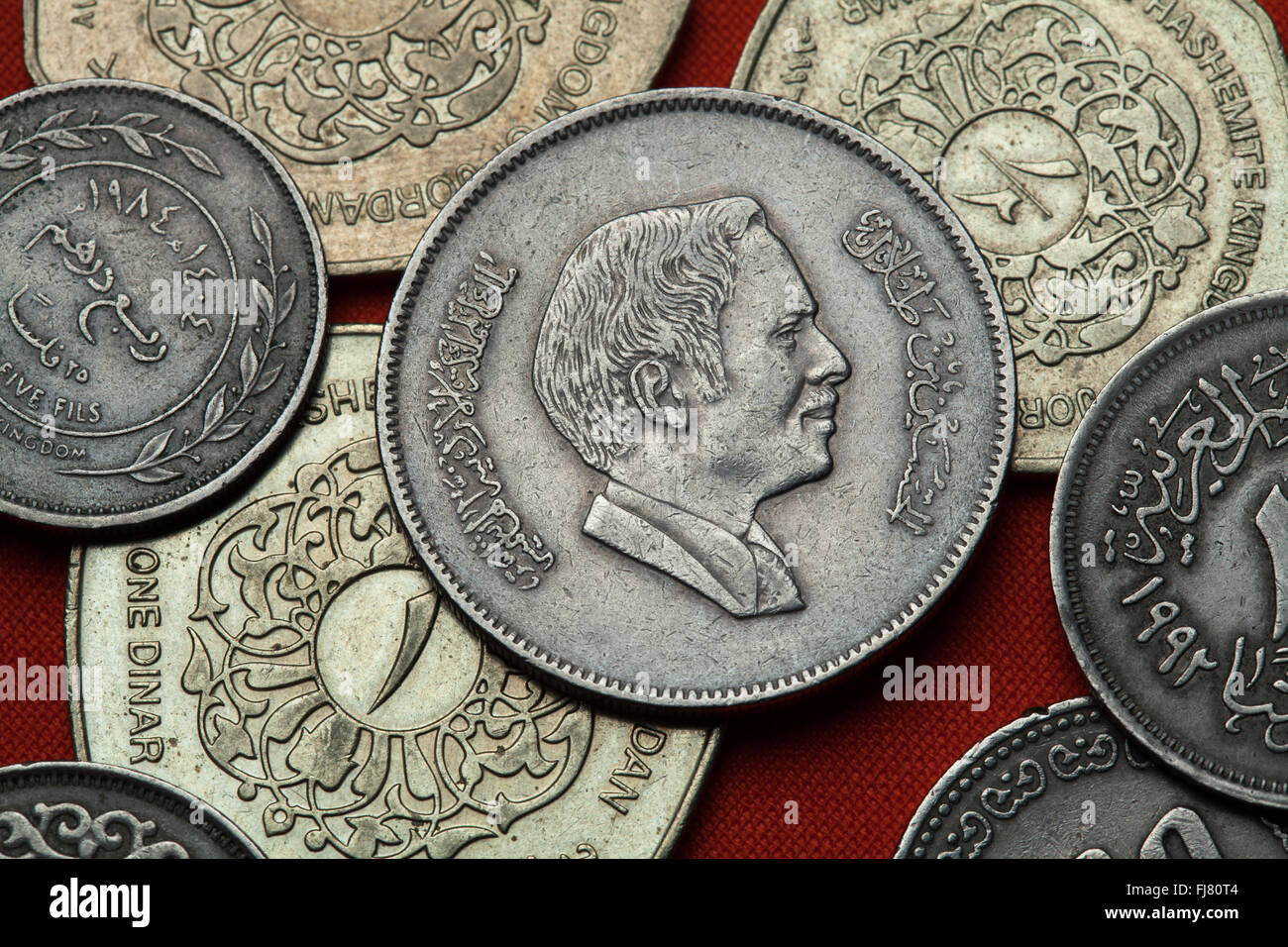 Coins of Jordan. King Hussein bin Talal of Jordan depicted in the Jordanian 100 fils coin. Stock Photo