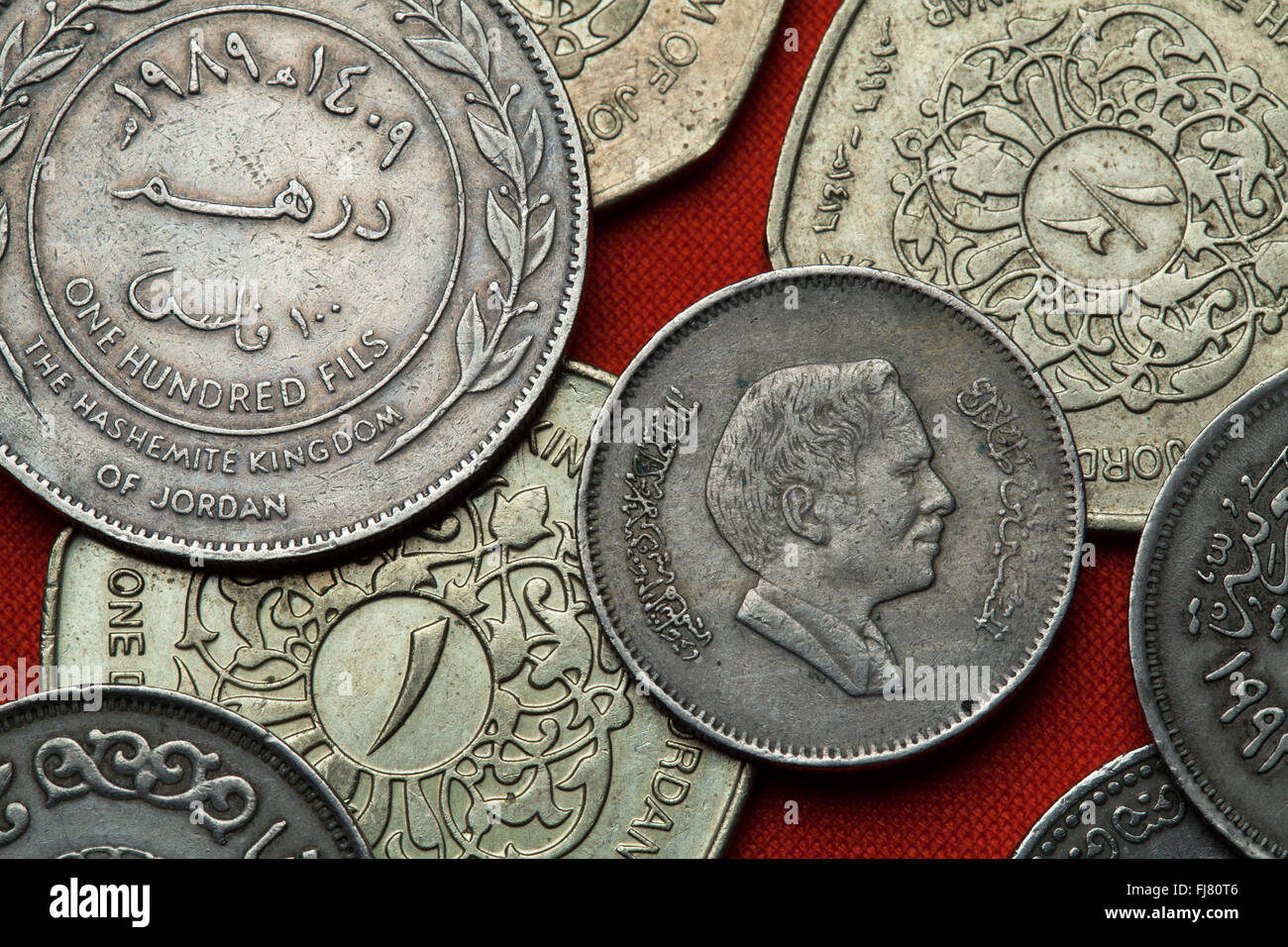 Coins of Jordan. King Hussein bin Talal of Jordan depicted in the Jordanian 25 fils coin. Stock Photo