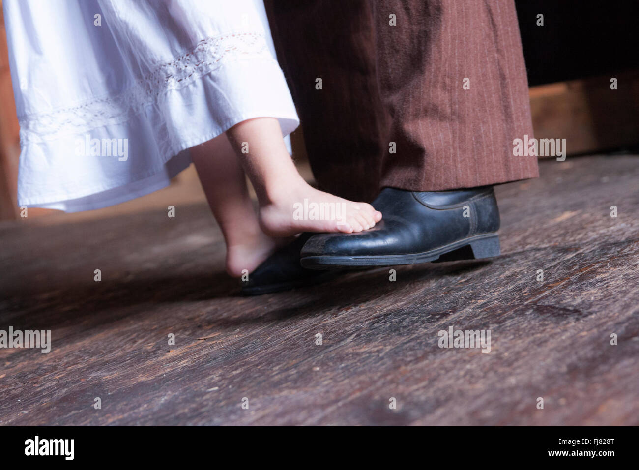 Dancing on Daddy's shoes Stock Photo Alamy