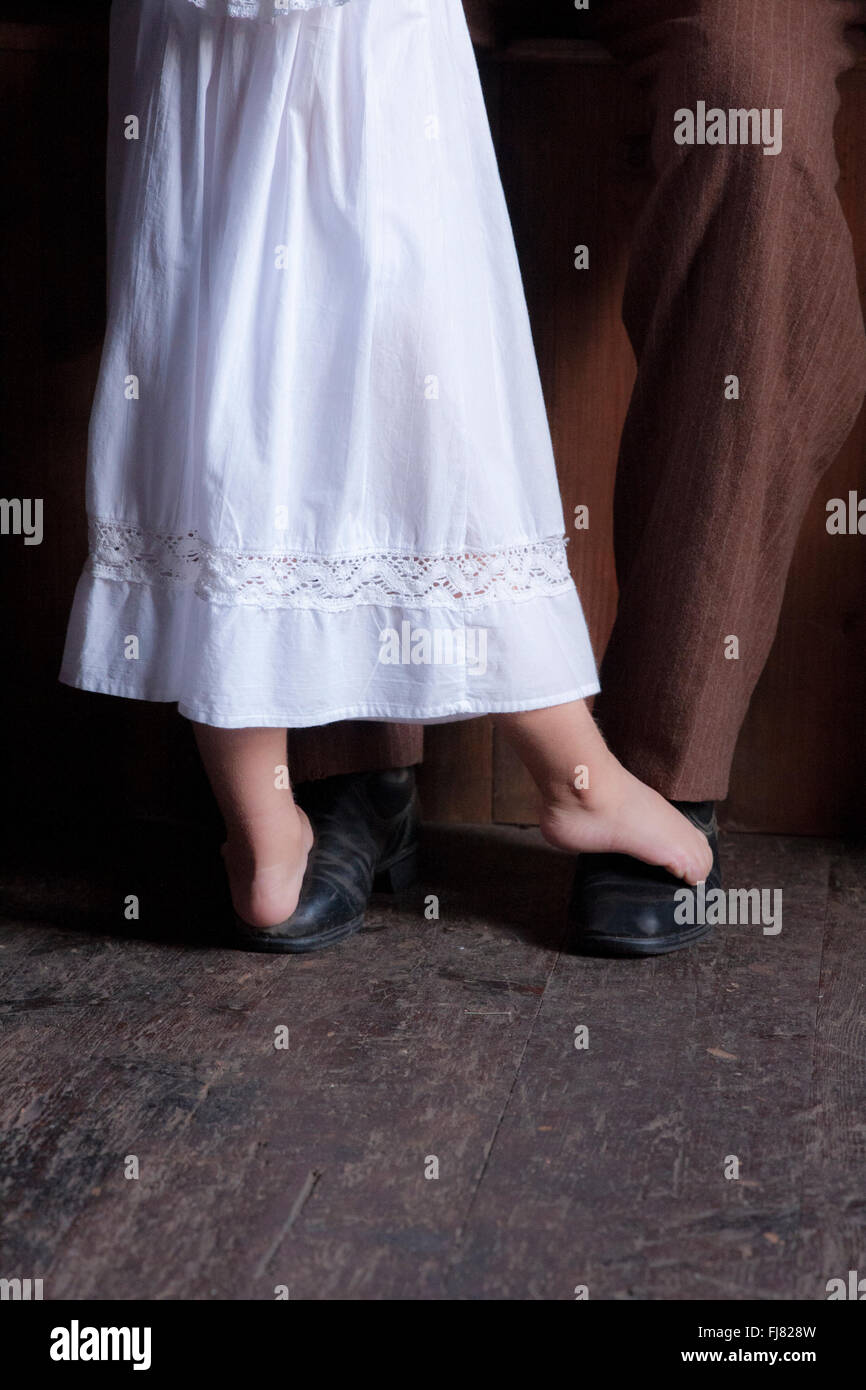 Dancing on Daddy's shoes Stock Photo Alamy