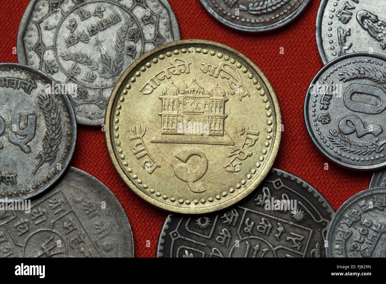 Coins of Nepal. Janaki Mandir Temple in Janakpur, Nepal depicted in the Nepalese two rupee coin. Stock Photo