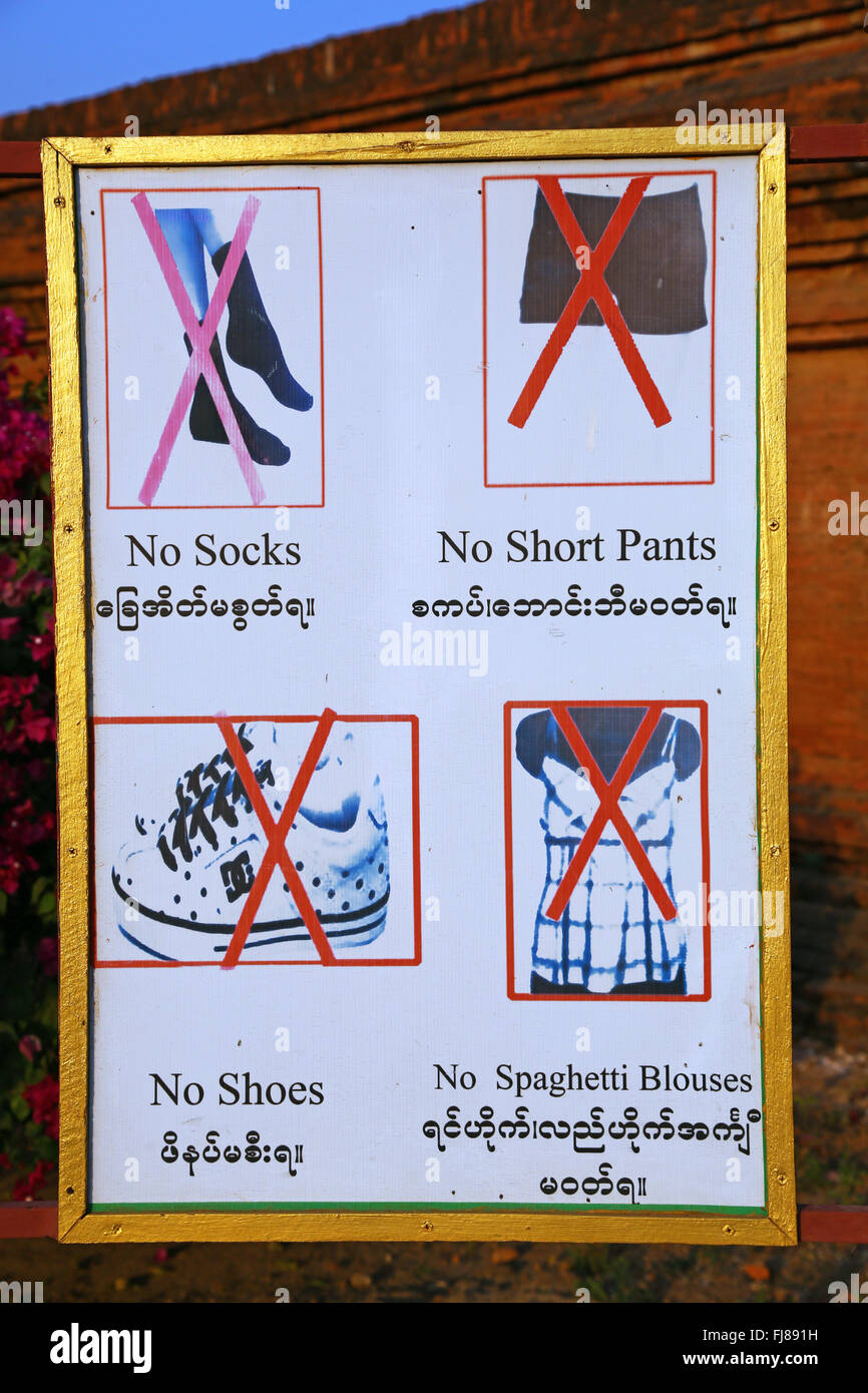 Temple etiquette sign advising no shoes etc. at Sulamani Guphaya Temple Pagoda on the Plain of Bagan, Bagan, Myanmar (Burma) Stock Photo