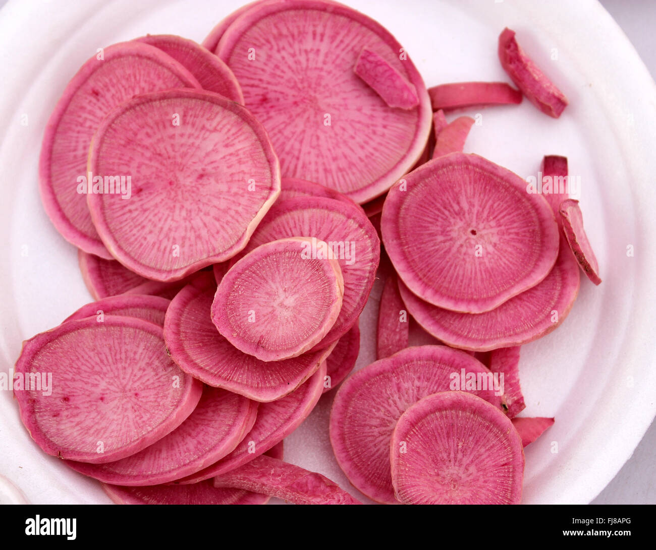 PUSA Gulabi Radish, Raphanus sativus, pink fleshed radish variety, rich in nutrients, antioxidants, carotenoids and anthocyanins Stock Photo