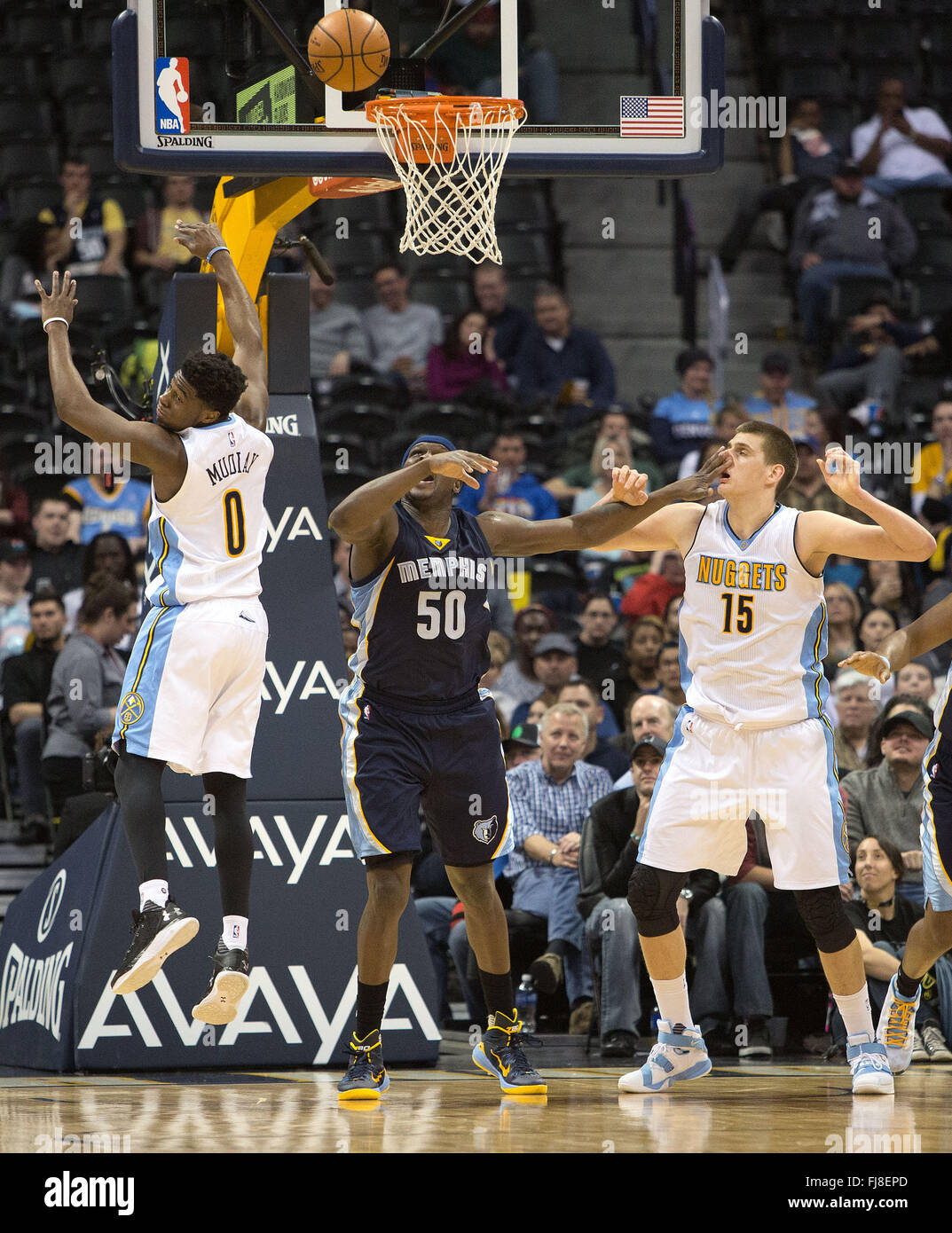 Denver, Colorado, USA. 29th Feb, 2016. Nuggets NIKOLA JOKIC, right, gets a hand on his face by Grizzlies ZACH RANDOLPH, center, as they go up for the rebound during the 2nd. Half at the Pepsi Center Monday night. The Grizzlies beat the Nuggets 103-96. Credit:  Hector Acevedo/ZUMA Wire/Alamy Live News Stock Photo
