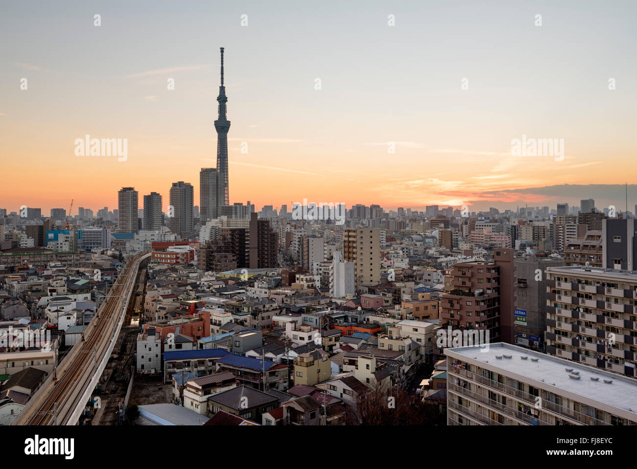 Tokyo; Japan -January 9; 2016: Tokyo Skyline at dusk, view of Asakusa district , Skytree visible in the distance. Stock Photo