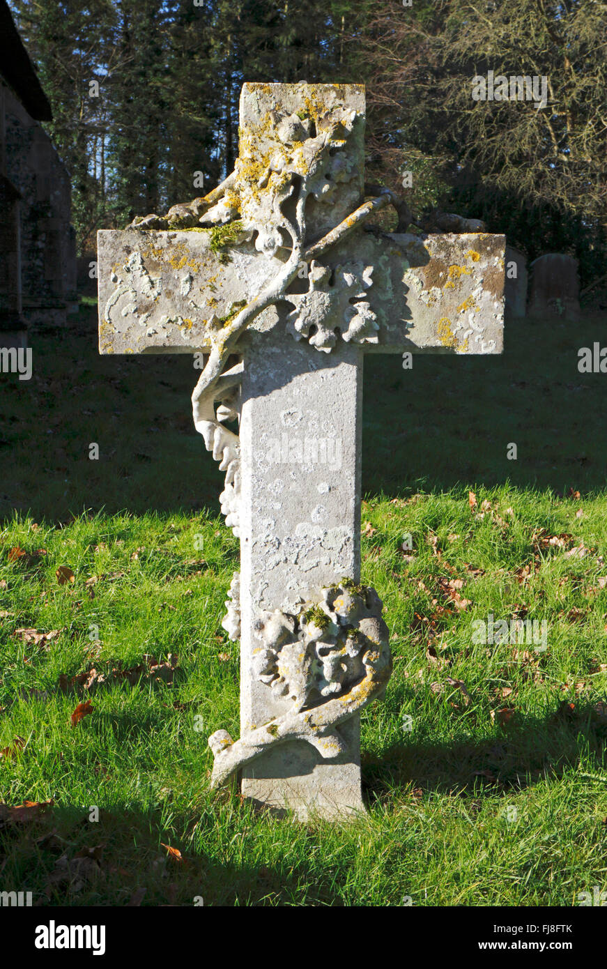 A headstone with twisted vine in a Norfolk churchyard. Stock Photo