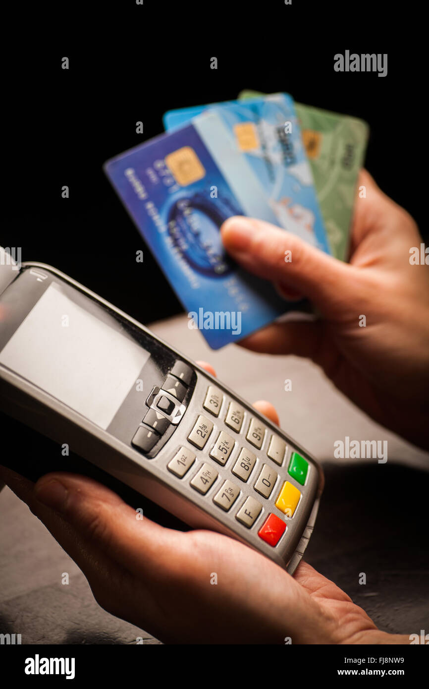 Color image of a POS and credit cards Stock Photo - Alamy