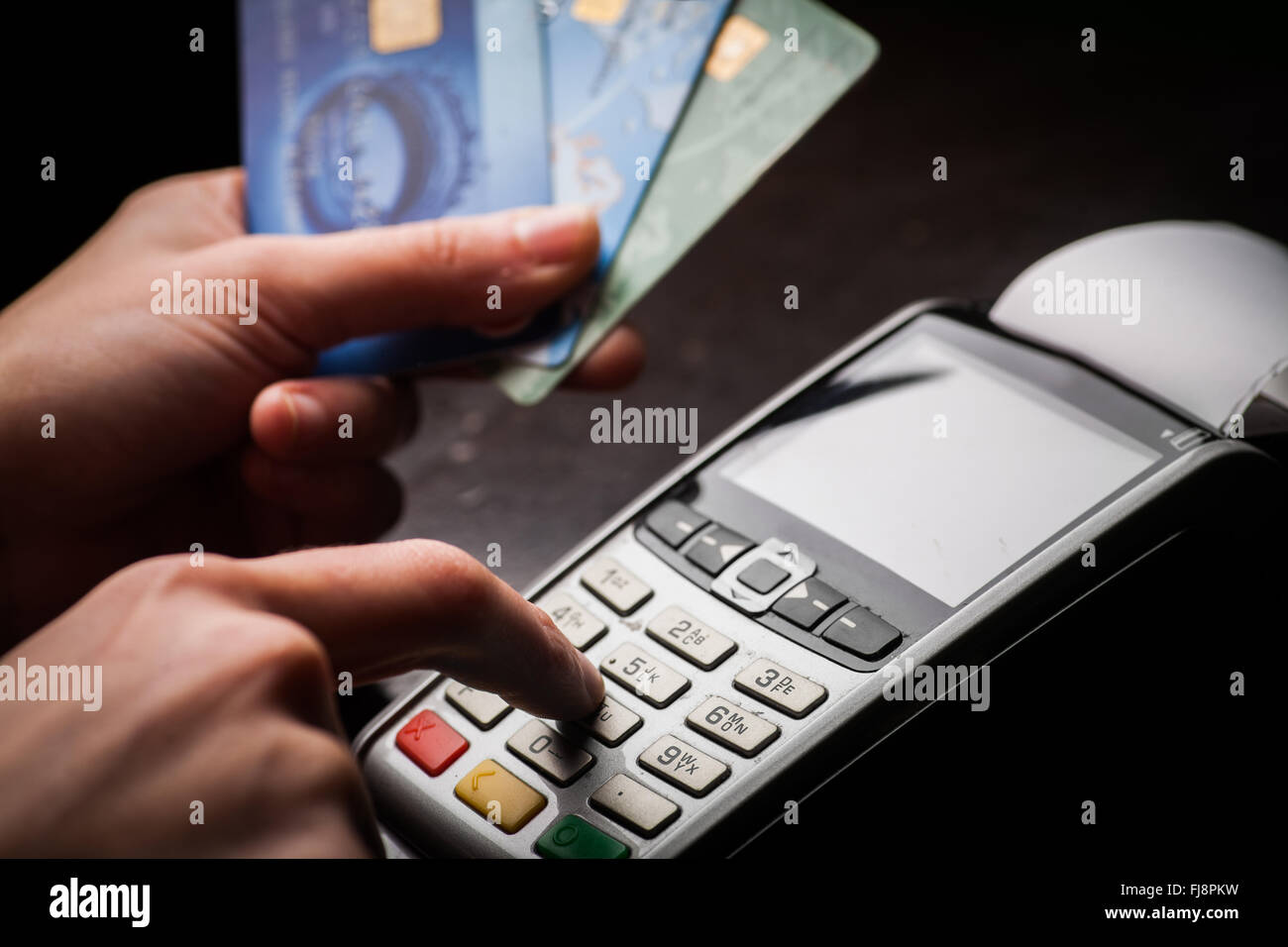 Color image of a POS and credit cards Stock Photo - Alamy