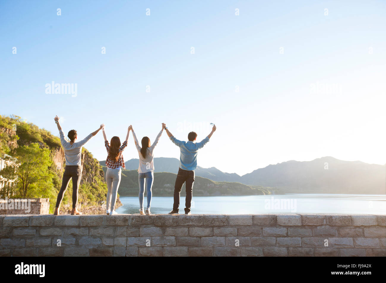 Happy Chinese friends Stock Photo Alamy