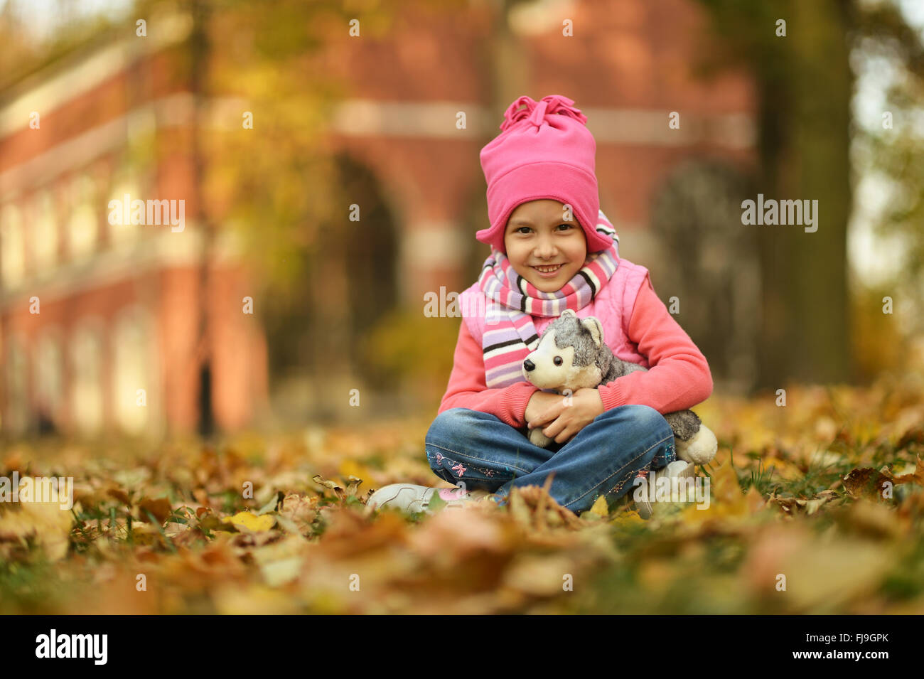 Girl in autumn park Stock Photo - Alamy