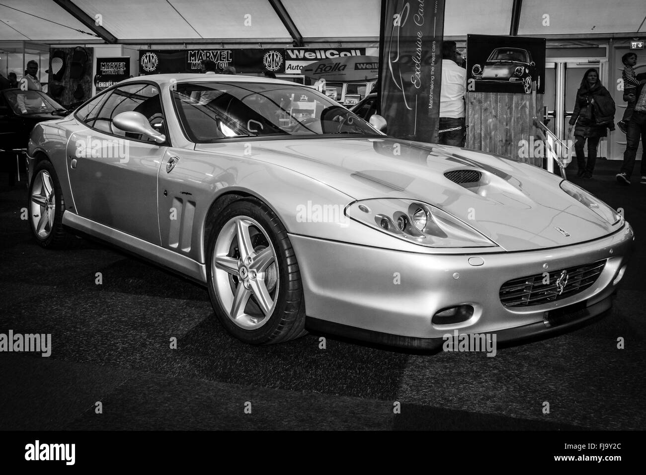 Grand tourer Ferrari 575M Maranello, 2003. Black and white. The designer of the car body Lorenzo Ramaciotti at Pininfarina. Stock Photo