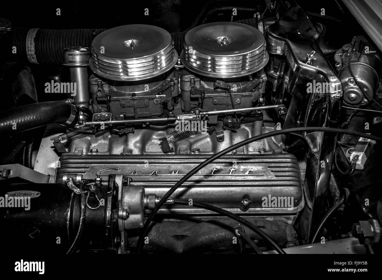 The 283 cubic-inch V8 in the 'Cheaterville' of sports car Chevrolet Corvette, 1957. Black and white. Stock Photo