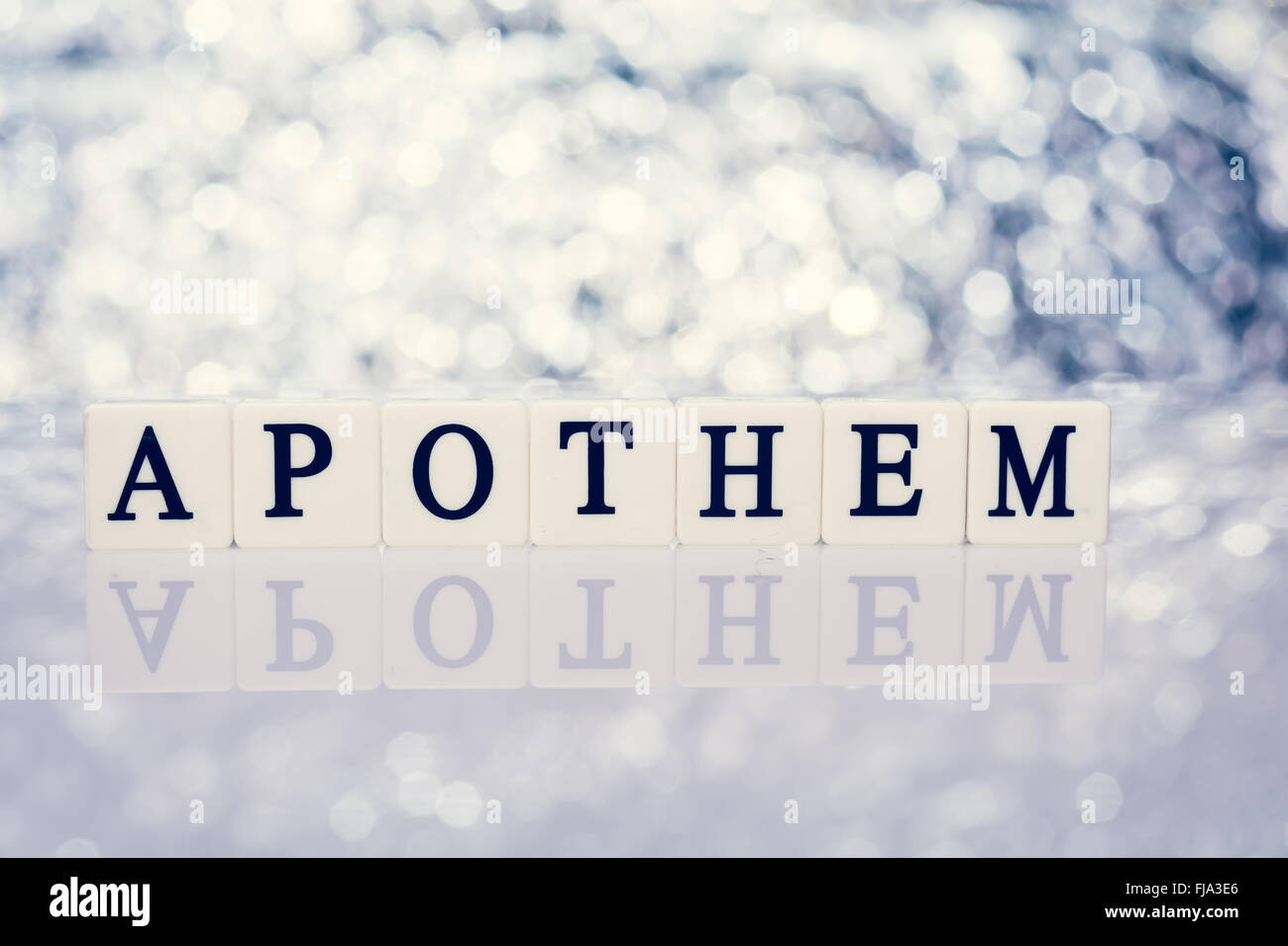 Written word of tiles with letters - apothem Stock Photo - Alamy