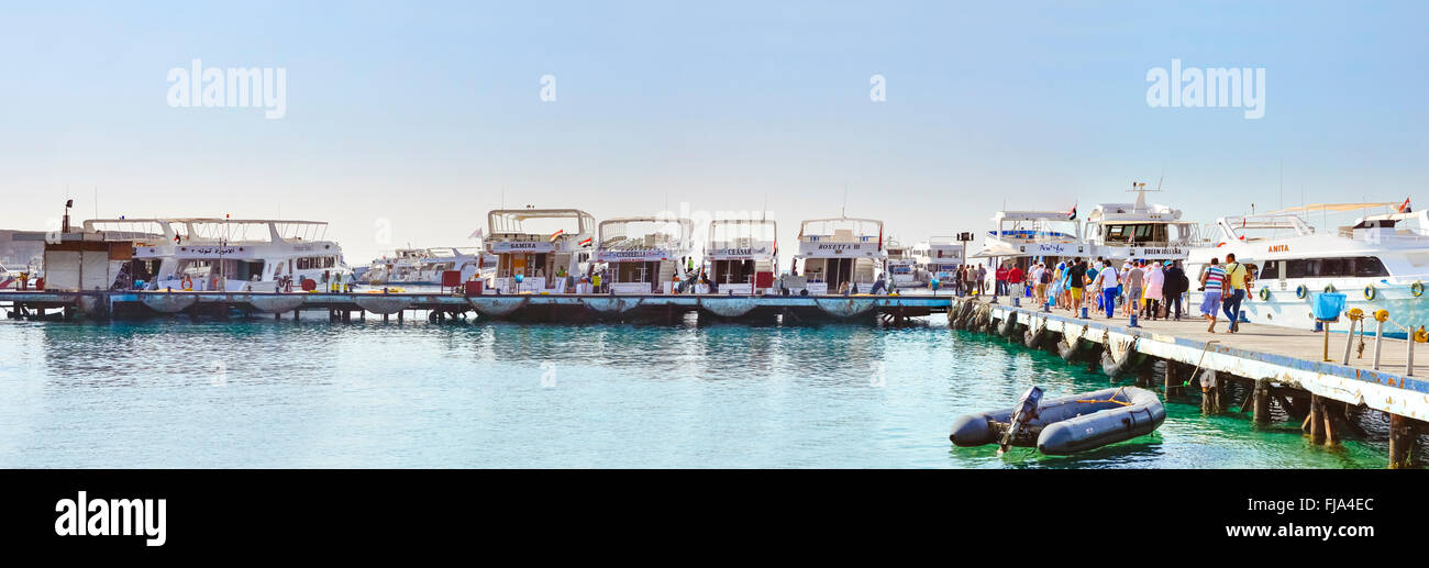 SHARM EL SHEIKH, EGYPT - FEBRUARY 25, 2014: Marina: Pleasure sightseeing boats on the Parking lot of boat Park, boat trip Stock Photo