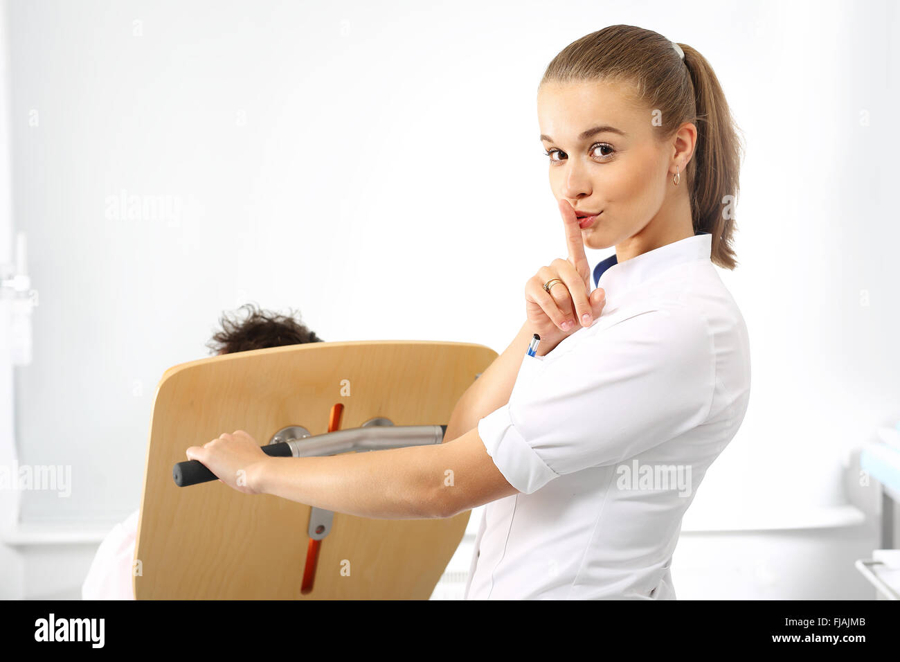 A nurse tends to a patient. Help care, the nurse takes the patient. Nursing, medicine and health. Stock Photo